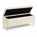 Panca contenitore in tessuto bouclé beige con gambe in metallo dorato